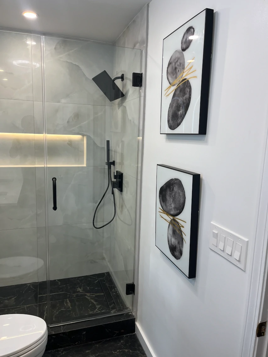 frameless glass shower with rain head